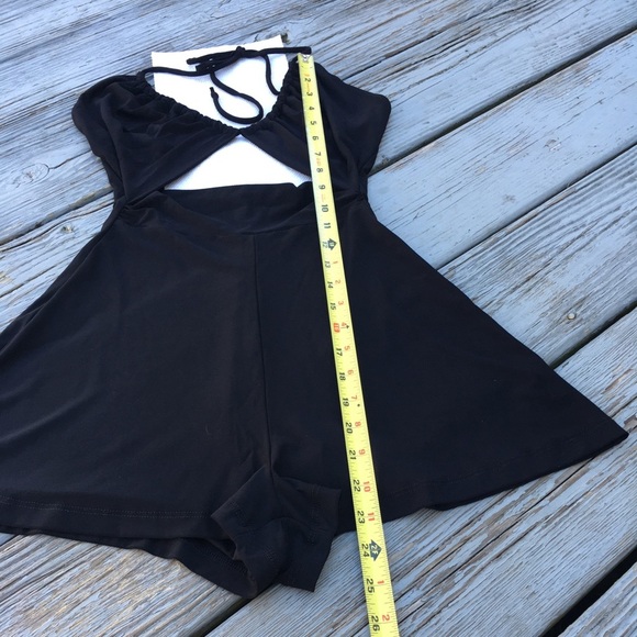 back less black romper with ties neck and open under chest. - Picture 5 of 8